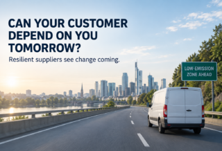 White delivery van approaching a low-emission zone, illustrating how resilient suppliers anticipate change and strengthen sustainable value chains.