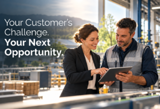 Business professionals collaborating in a manufacturing facility, illustrating how sustainability creates new customer opportunities and stronger supplier relationships.